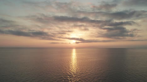 sunrise shines reflected on biwako lake japan landscape of vibrating water gold sun background