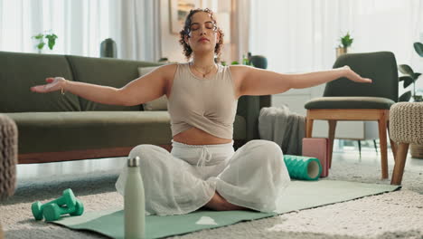 woman practicing yoga and meditation at home