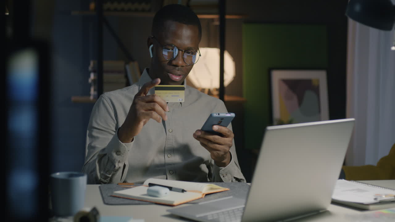 Man Working Late at Night in an Office