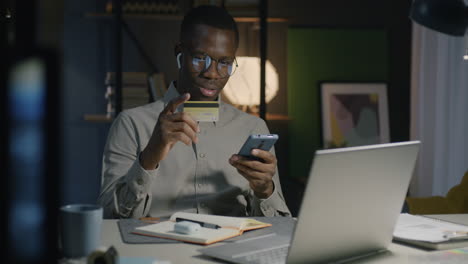 man working late at night in an office