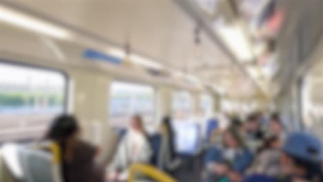 passengers ride a bustling train in melbourne, australia, with vibrant lighting and dynamic motion blur