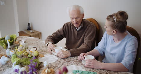 Happy-Easter-Grandfather-Talking-With-Granddaughter-1