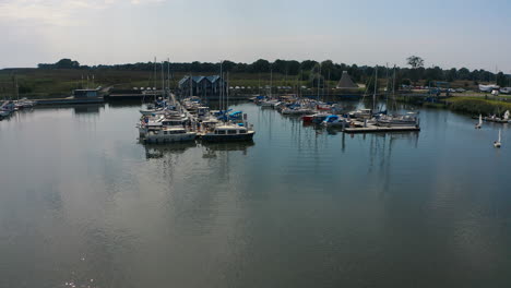 beautiful aerial shot of boats and yachts in marina in blotnik, pomeranian, poland