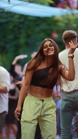 woman dancing at outdoor festival