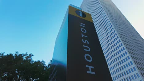 Skyscrapers-of-Downtown-Houston-behind-directional-city-sign