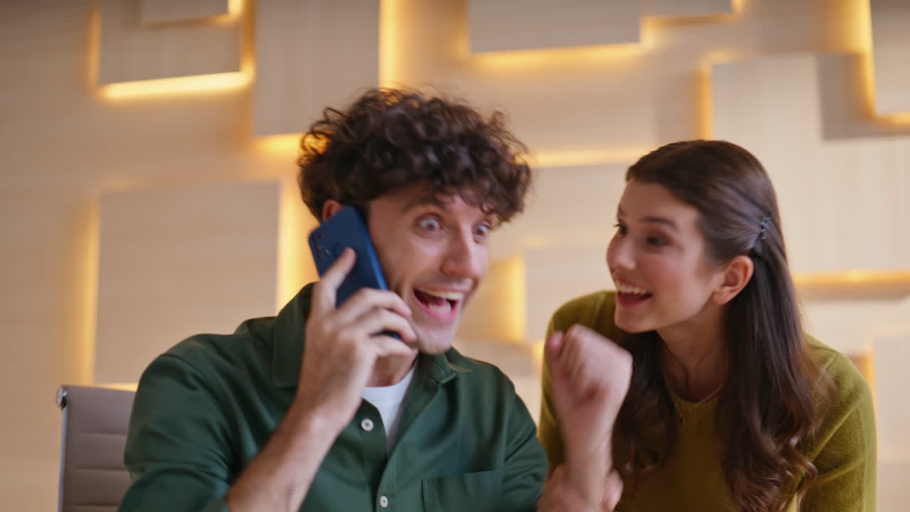 Couple having a conversation, man talking on the phone