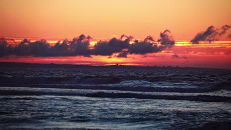 vibrant santa cruz sunset with stunning ocean views, golden skies, and rolling waves—ideal for cinematic scenes, travel videos, or peaceful nature backgrounds.