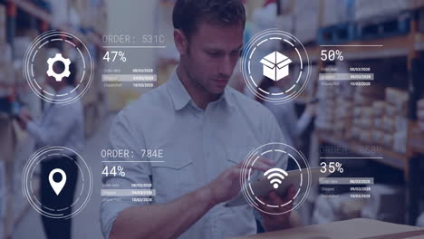 using tablet, warehouse worker viewing animation of digital order tracking data
