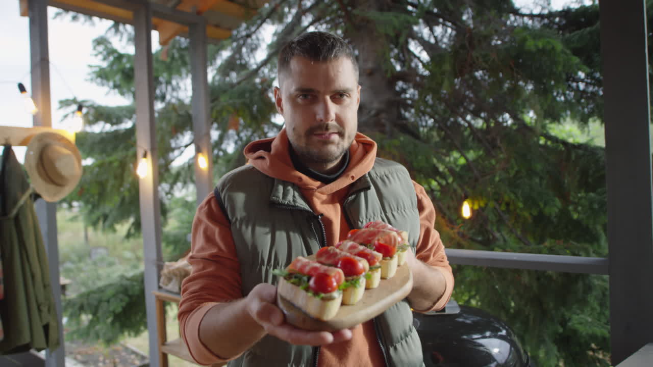Food Blogger Posing with Bruschettas on Outdoor Terrace