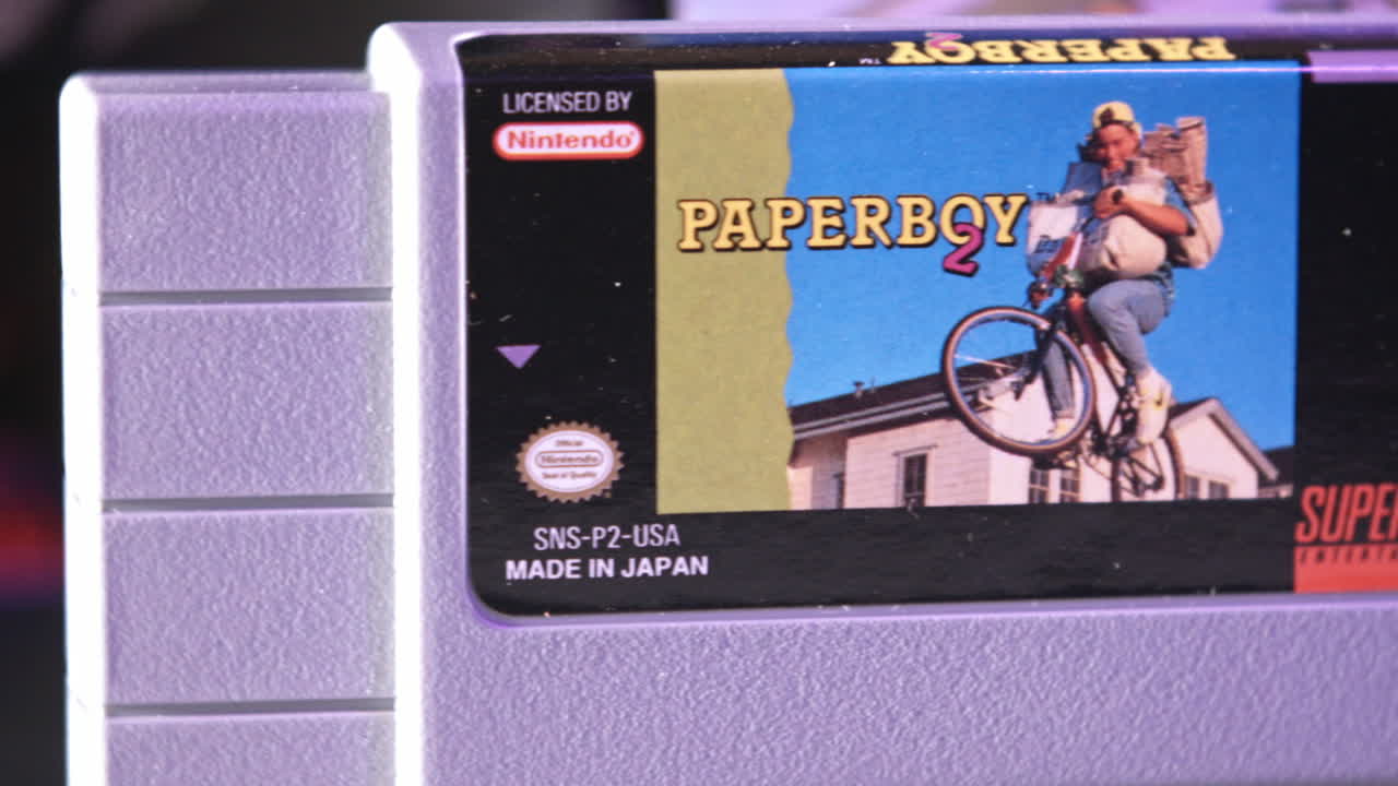 Vintage Super Nintendo Cartridge and Box in Purple Light SLIDE LEFT