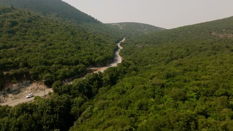 A-cinematic-aerial-shot-of-a-road-on-the-island-Ithaca-in-Greece