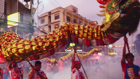 chinese new year dragon parade held in thailand