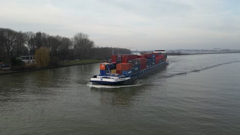 cargo ship sailing in a river