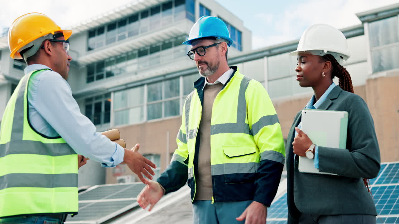 Team of Engineers Meeting on Solar Panel Roof