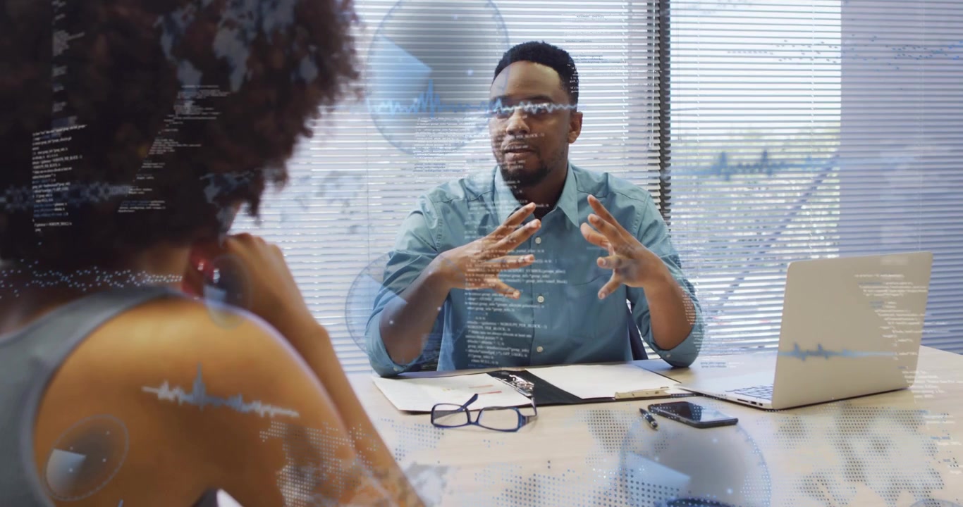 Interviewer speaking candidate listening causing business HUD intensifying then fading over laptop
