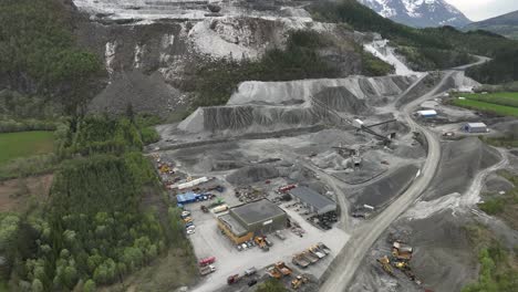 visnes kalk as mining site close to molde in norway - high angle aerial view of machinery and headquarter