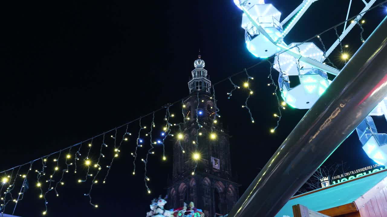Ferris Wheel and Tower at Night