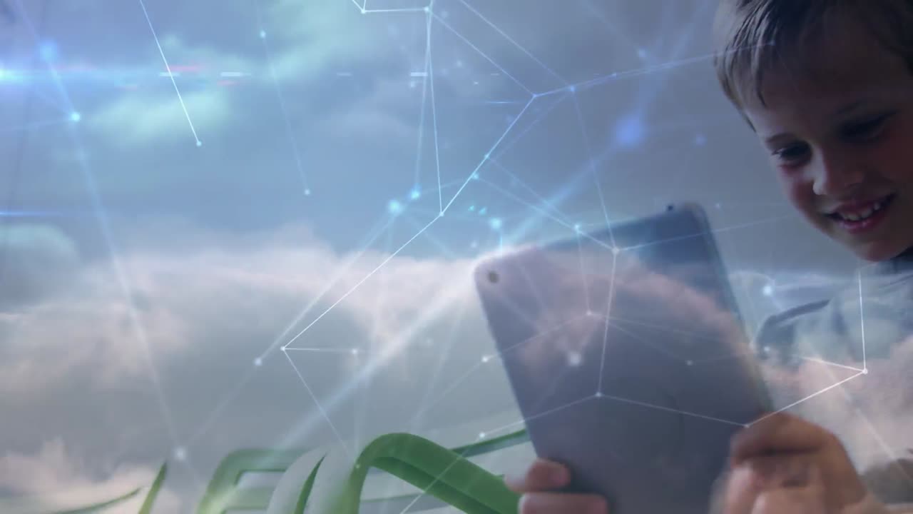 Animation of networks of connections and sky over caucasian boy using tablet