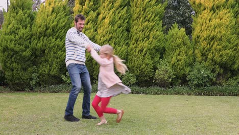 Father-and-daughter-playing-in-the-garden-4K-4k