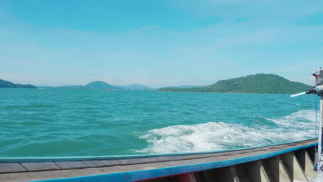 tropical island view from longtail boat
