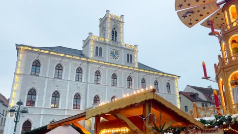 weimar city hall in winter season with christmas market in december