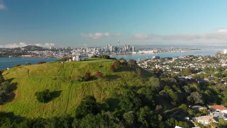 SLOWMO---Aerial-shot-of-Mount-Victoria-and-Sky-Tower-in-Auckland,-New-Zealand