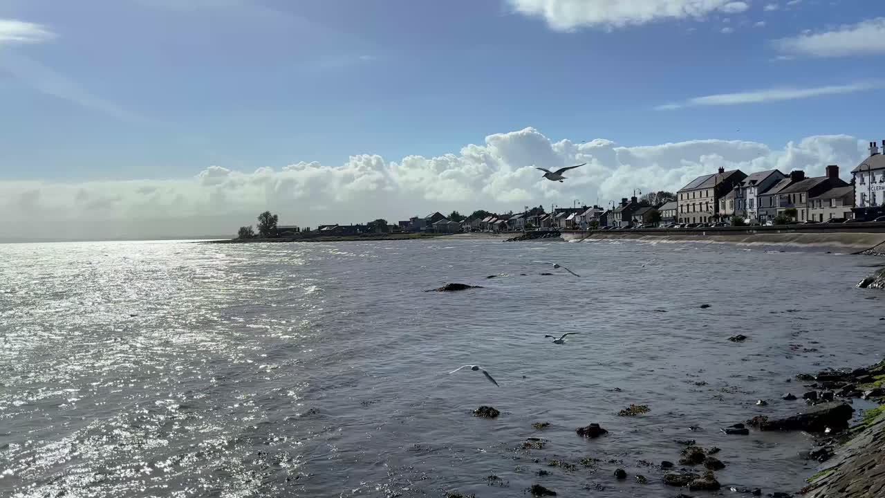 A picturesque seaside town in Blackrock, near Dundalk, County Louth, Ireland, under a sunny sky