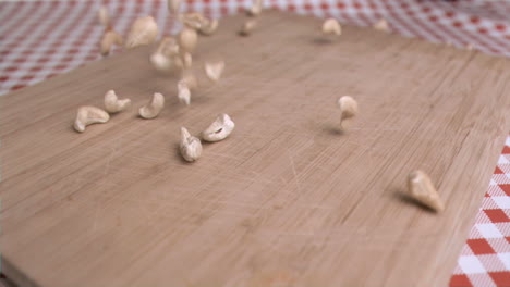 cashew nuts being poured in super slow motion