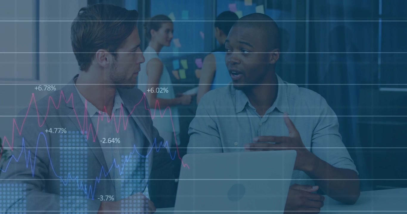 Faint grid fading on screen triggers two teammates analyzing line graphs monitoring business growth