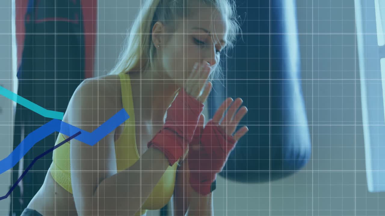 gráficos azules que se mueven sobre líneas de cuadrícula contra el reposo del boxeador femenino