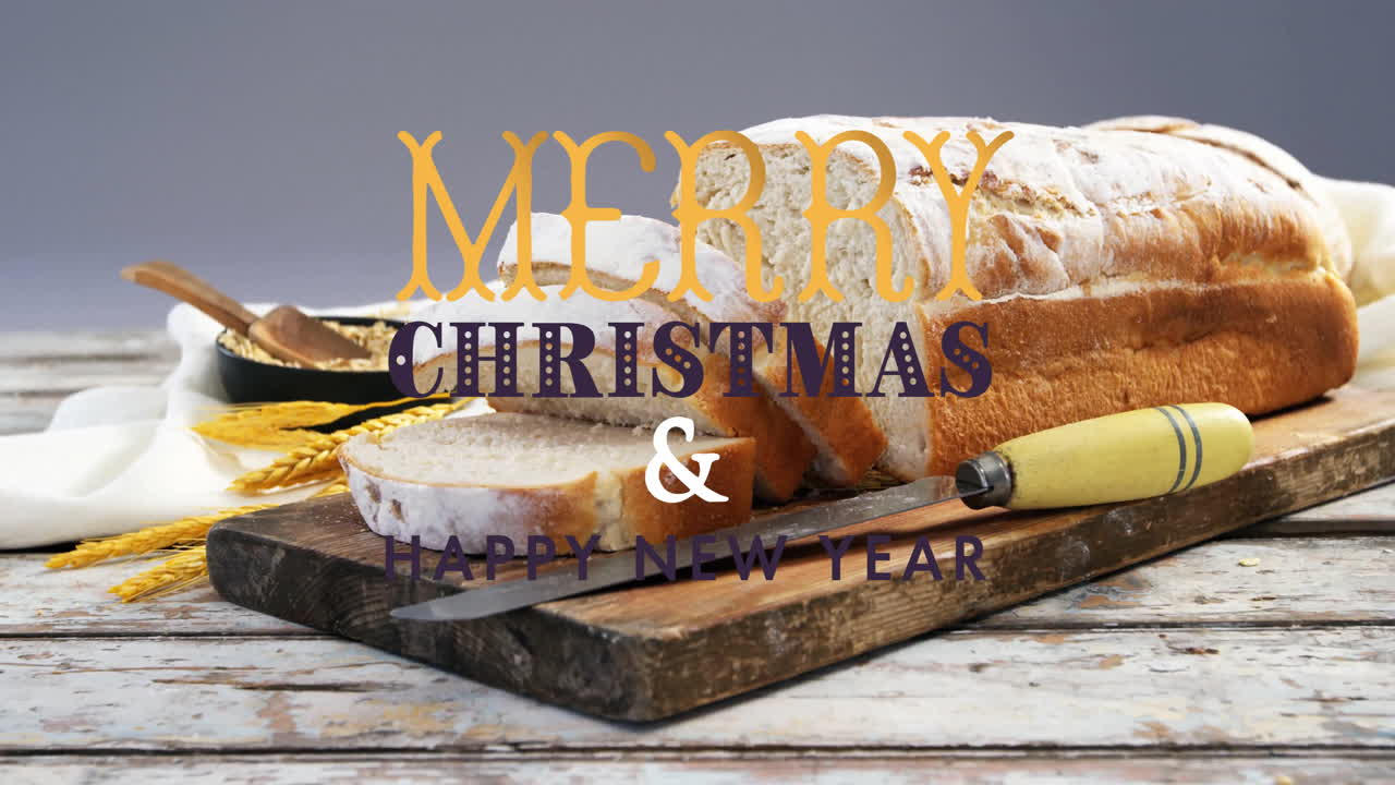 Bread loaf on wooden board with Merry Christmas  and  Happy New Year animation overlay