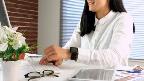 businesswoman working at her desk