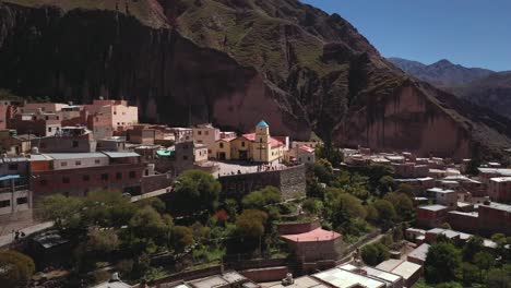 aerial pan of town of iruya and nearby mountains in salta, argentina