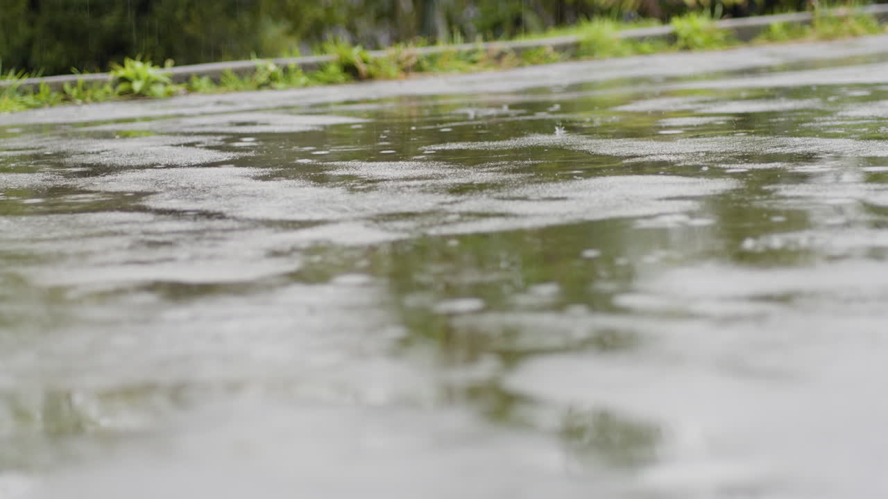 Rain Pouring On The Road. - closeup shot