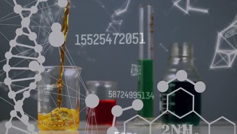 animación de la cadena de adn girando sobre copas de medidas químicas