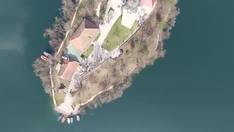 aerial view of the island with small church located in the middle of the lake bled, slovenia