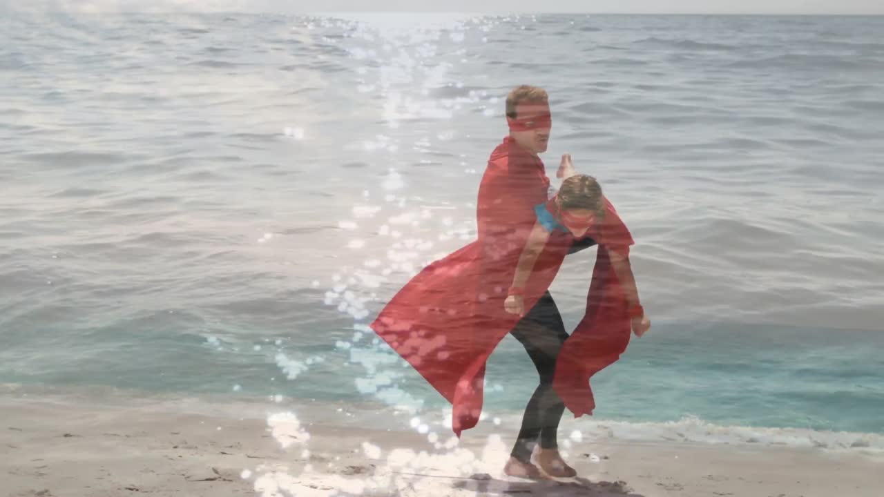 행복한 백인 아버지와 아들이 슈퍼히어로처럼 옷을 입고 즐겁게 지내는 바다의 애니메이션
