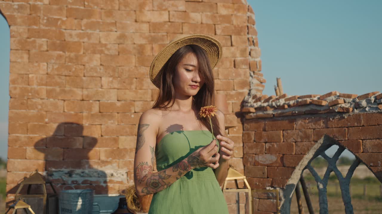 Woman with Flower in Ruins