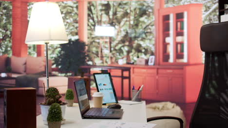empty modern home workstation of an entrepreneur with laptop and tablet