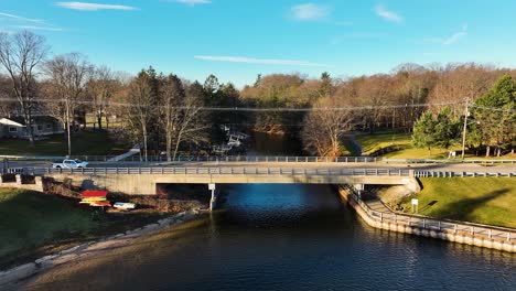 light traffic across an old cement bridge near the shores of lake michigan