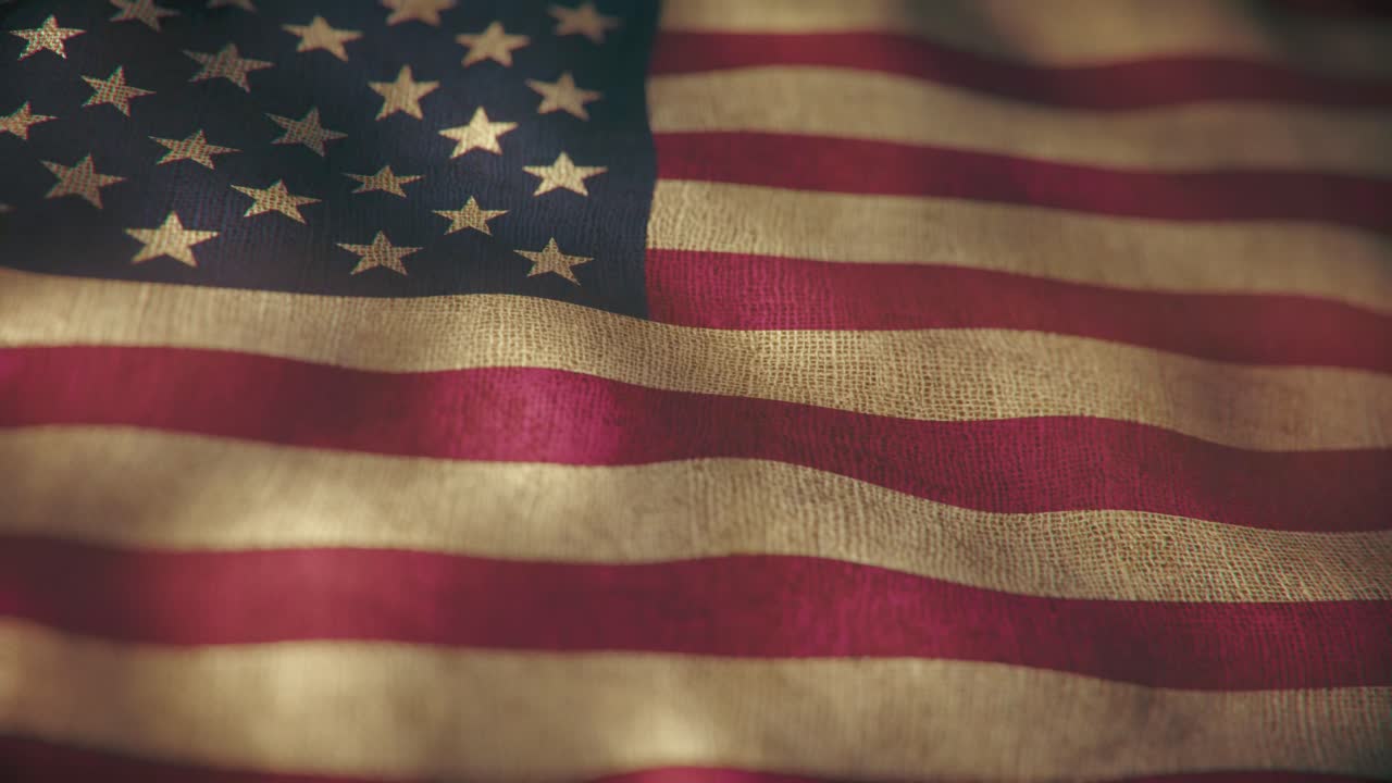 Seamless looping animation of a USA flag waving vigorously in the wind, perfect for patriotic, national, or celebratory themes. The flag moves dynamically with graceful, continuous motion