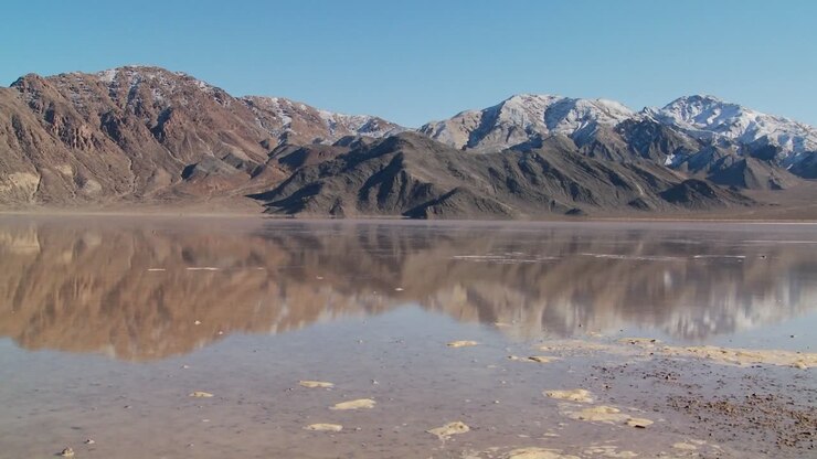 A pan across a lake of badwater in Death Valley National Park 1