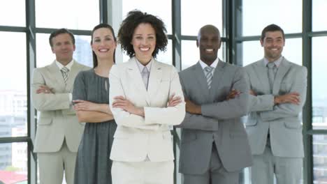 Multiethnic-Business-team-standing-with-folded-arms-