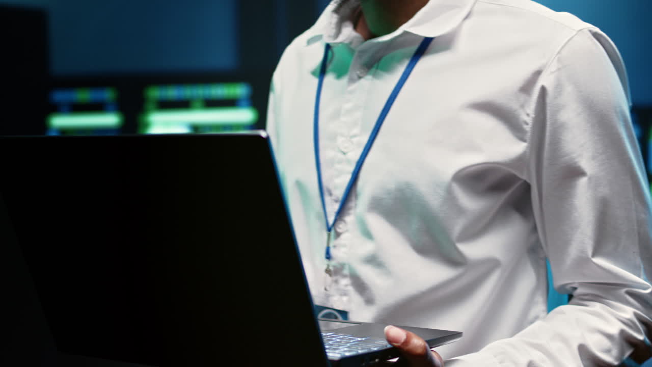 Engineer in data center fixing issues