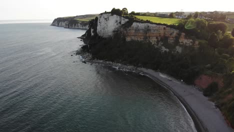Aerial-forward-shot-showing-the-cliffs-of-the-Jurassic-Coast-in-East-Devon-England