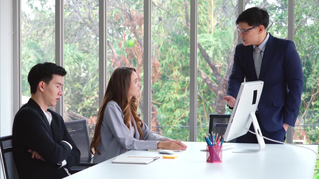 Angry business person dispute work problem in group meeting