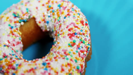 close-up of tasty doughnuts with sprinkles