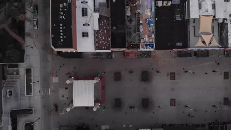 aerial footage over city flying over buildings