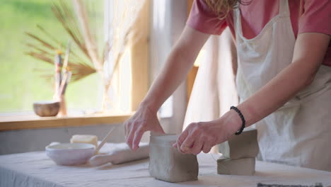 Woman Sculpting Clay