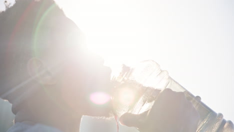 Black-man,-fitness-and-drinking-water-in-city